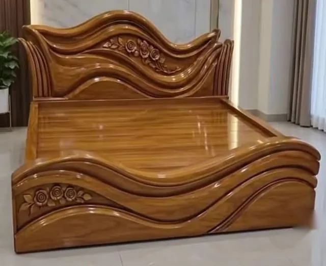 Carved wooden wave bed with rose motif